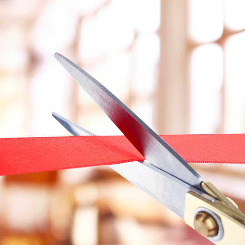 Restaurant grand opening ribbon cutting