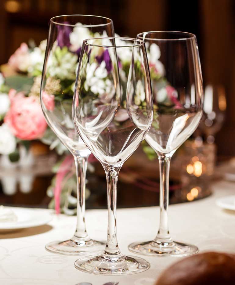 Restaurant table setting with wine glasses